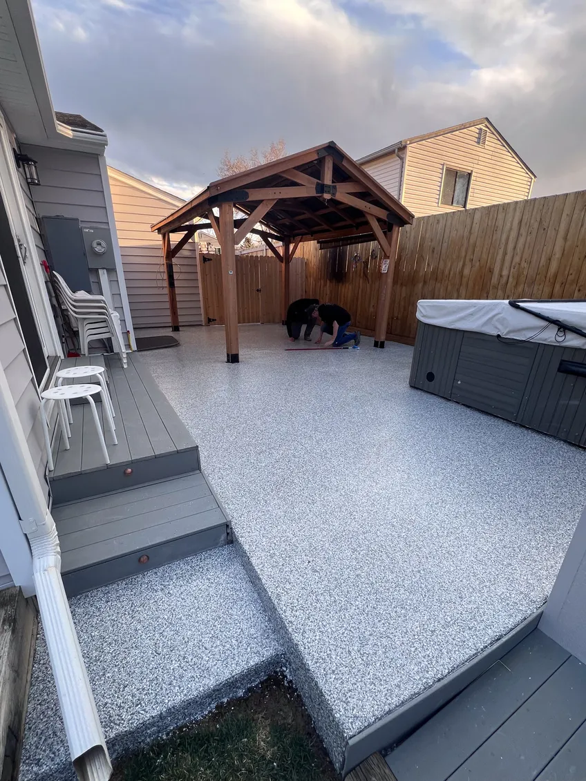 Flake floor installed on a backyard patio