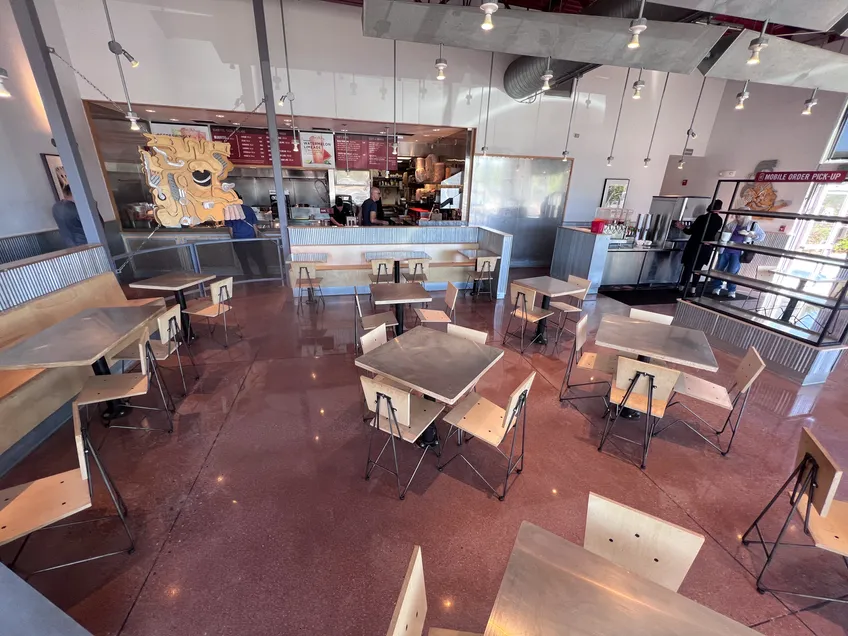 Epoxy resin installation over a wood floor at chipotle