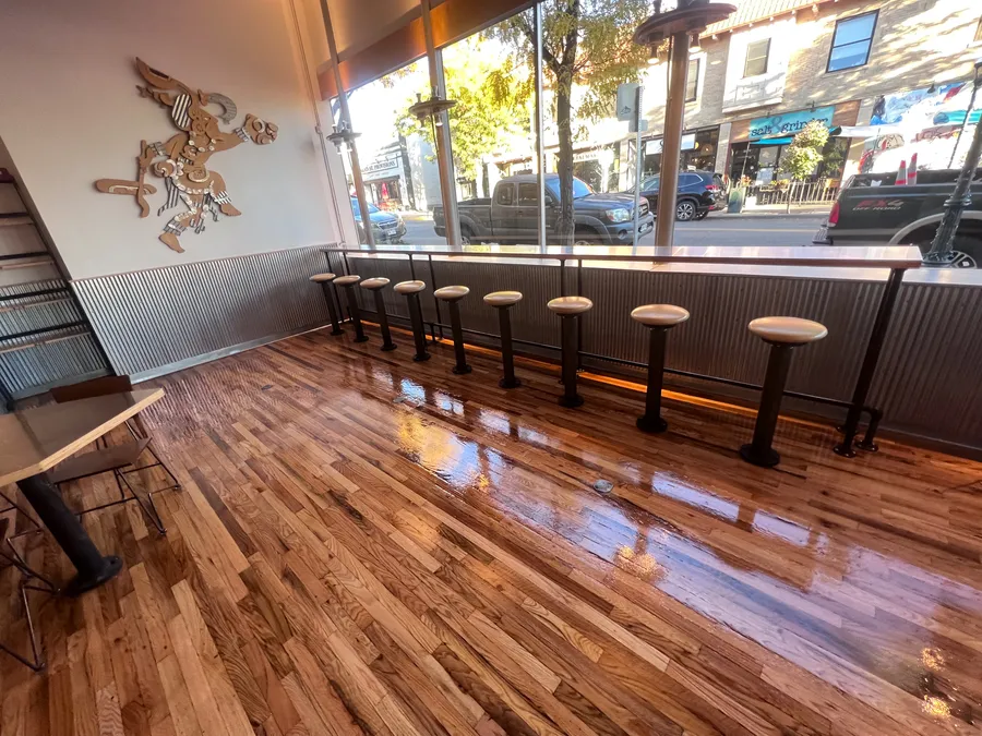 Common area of Chipotle with new epoxy coat over wood floor